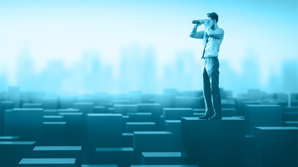 Man looking through binoculars