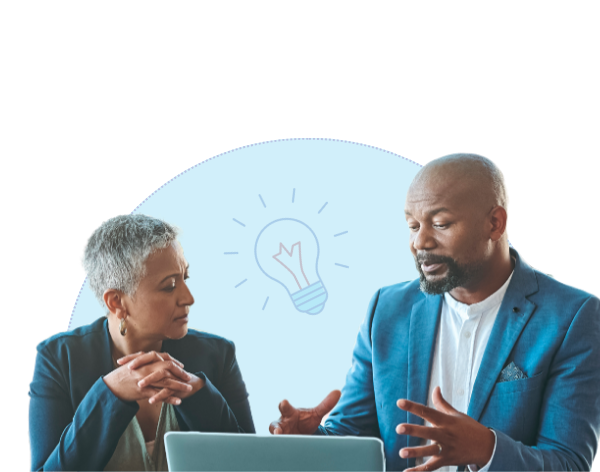 professionals talking in front of laptop with lightbulb icon